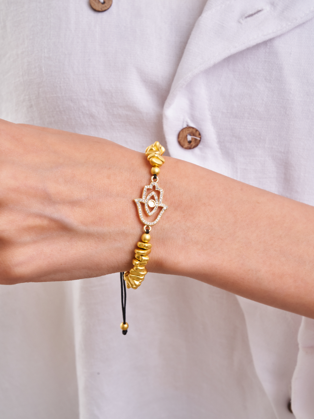 Gold Polished Hematite Hamsa Bracelet